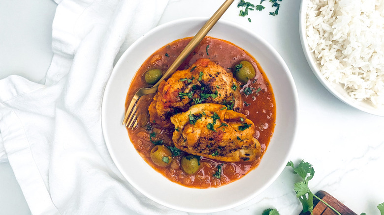 chicken fricassee in bowl with rice