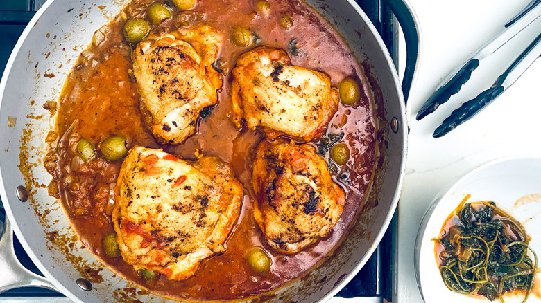 simmering chicken fricassee in pan