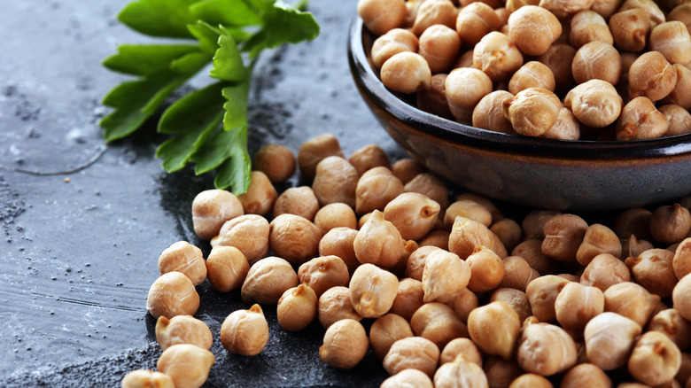 Chickpeas in bowl with herbs