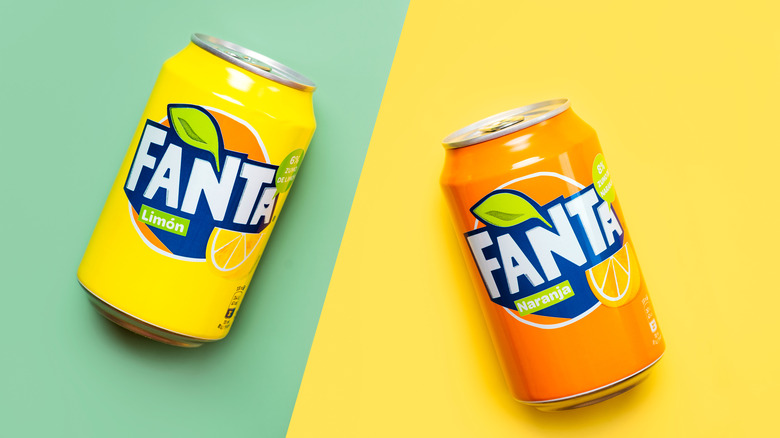 Two cans of Spanish-labeled Fanta