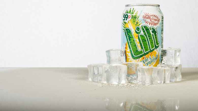 Can of UK soda Lilt with ice cubes