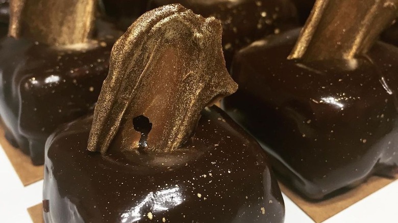 rows of fancy mousse bites on a tray