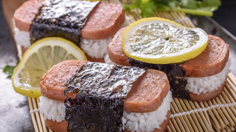 spam musubi on bamboo mat