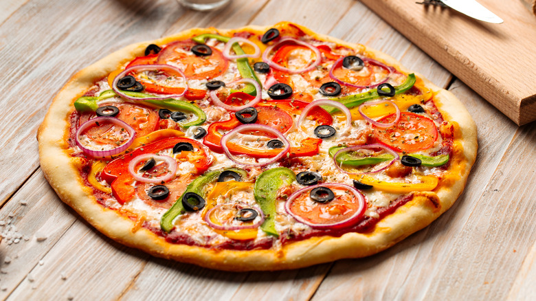 Pizza on wooden table