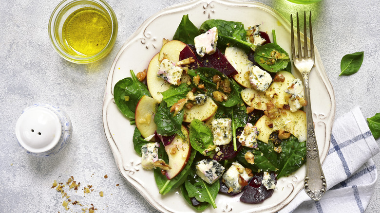 plated salad with apples