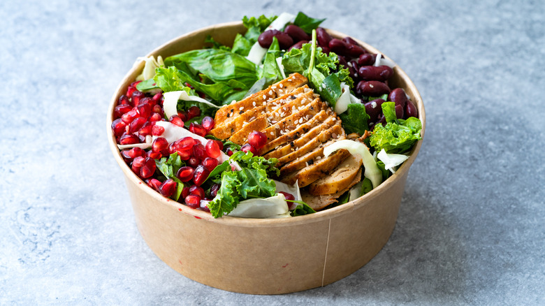 large salad bowl with pomegranate