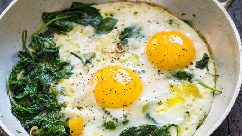 Fried eggs and spinach