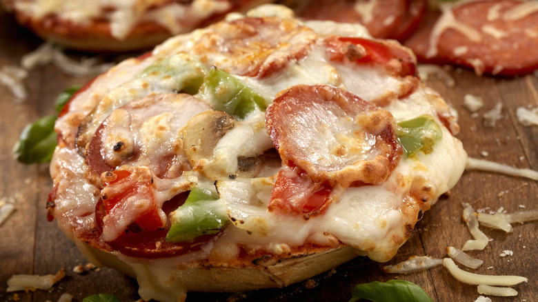 Pizza bagel with various toppings