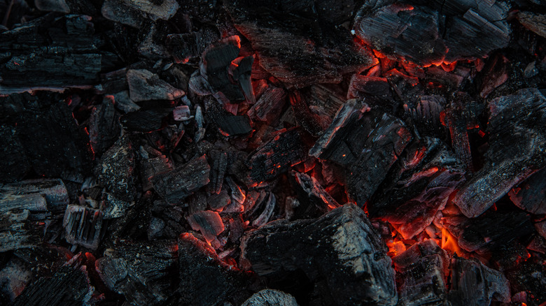 Smoldering charcoal in barbeque grill