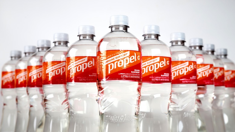 bottles of propel in a line