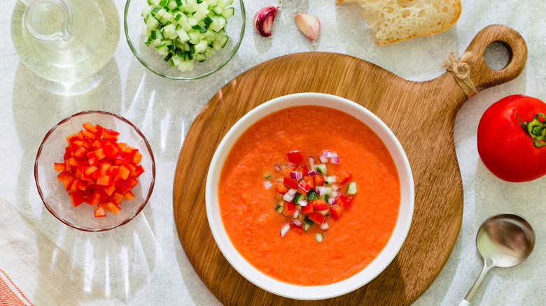 Gazpacho surrounded by ingredients