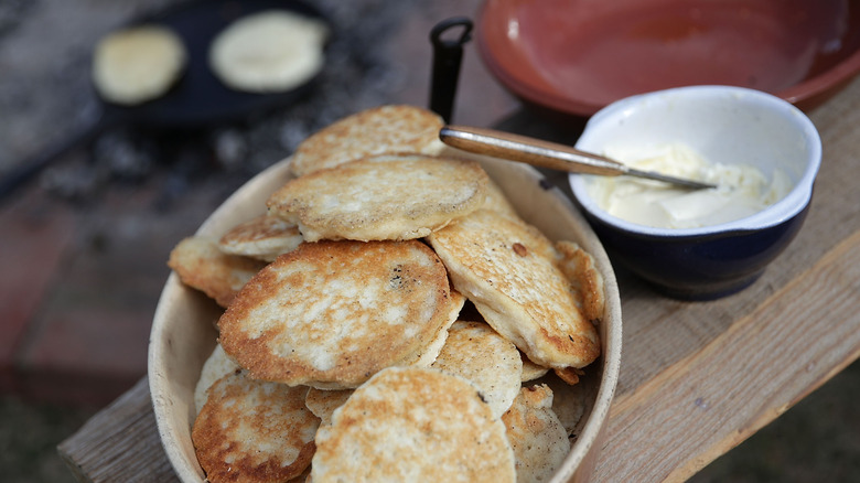 Bowl of hoecakes with butter