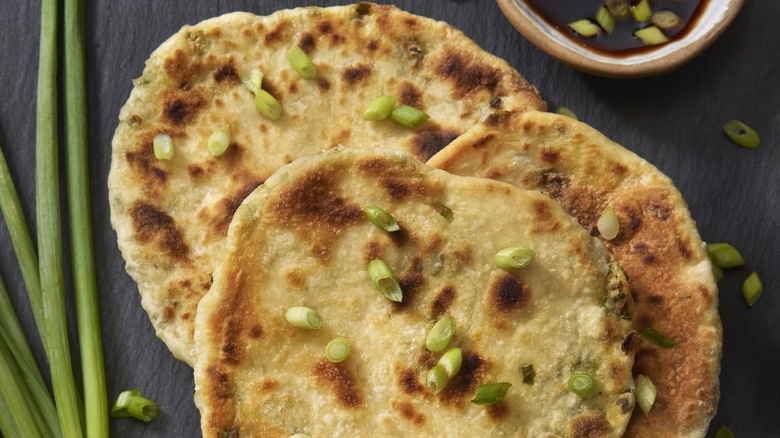 Scallion pancakes on plate