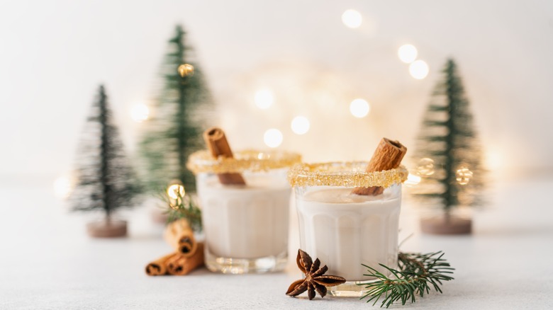 Eggnog with cinnamon sticks