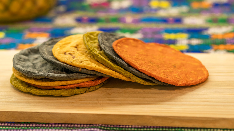 Colorful tortillas on wood
