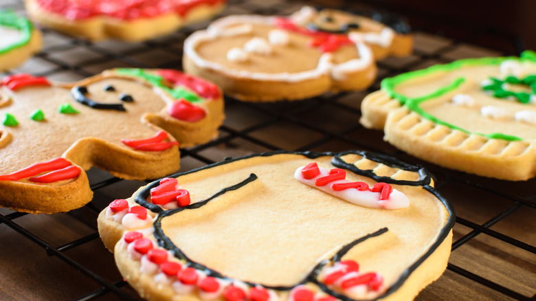 Cooling rack of ugly sweater cookies