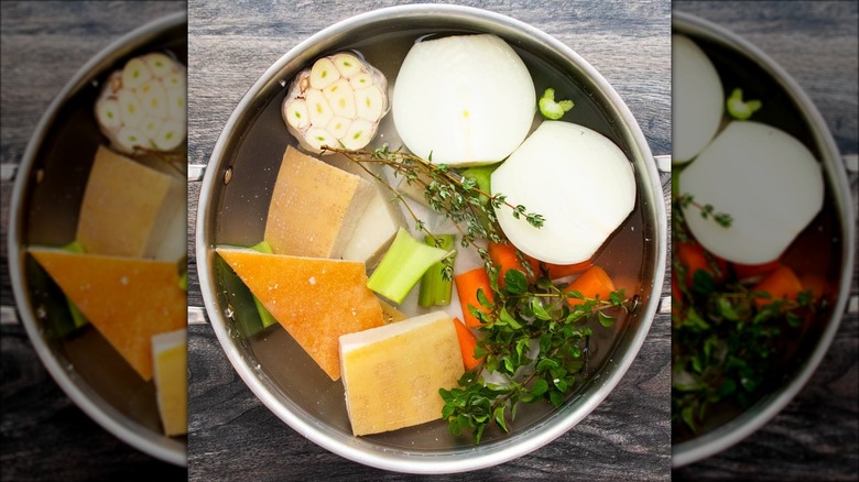 Parmesan broth in a saucepan