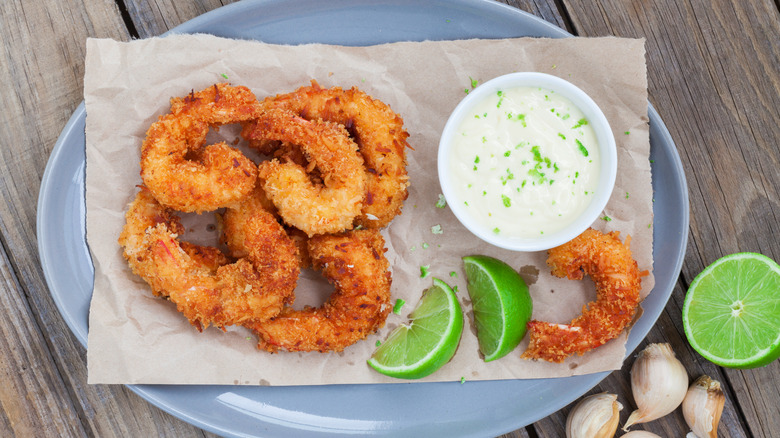 coconut shrimp served with lime and dipping sauce