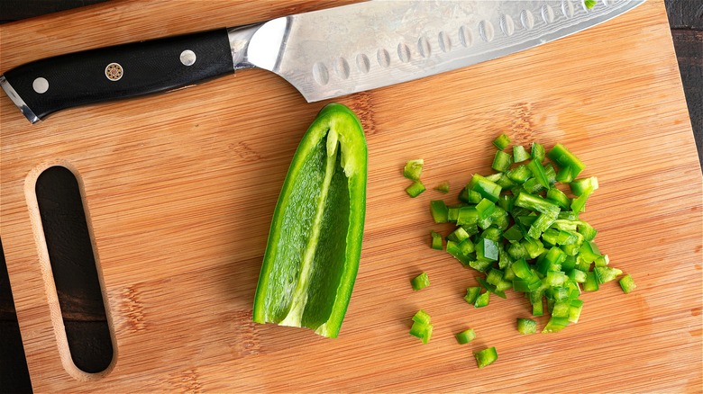 Raw jalapeño on cutting board 