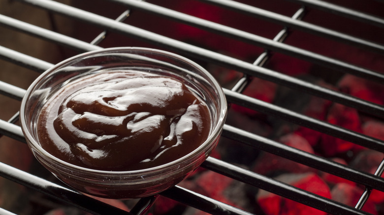 Barbecue sauce in a small glass bowl.