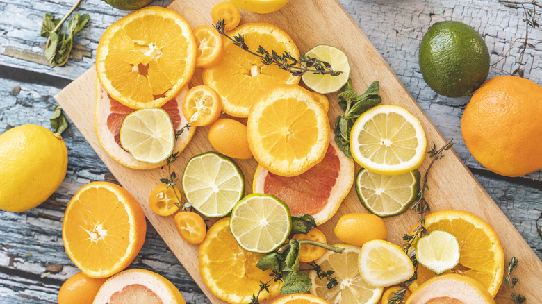 sliced citrus fruit on board