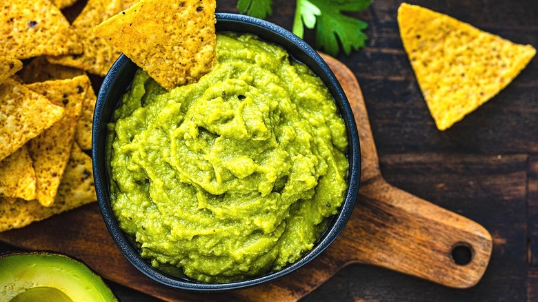 Bowl of guacamole with chips