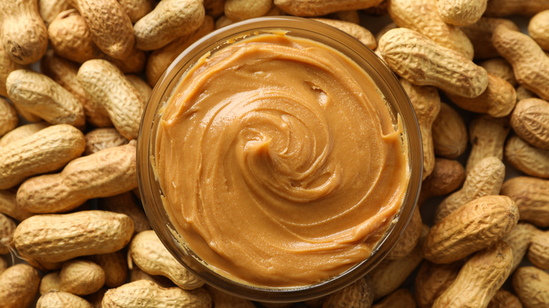 Bowl of peanut butter on whole peanuts