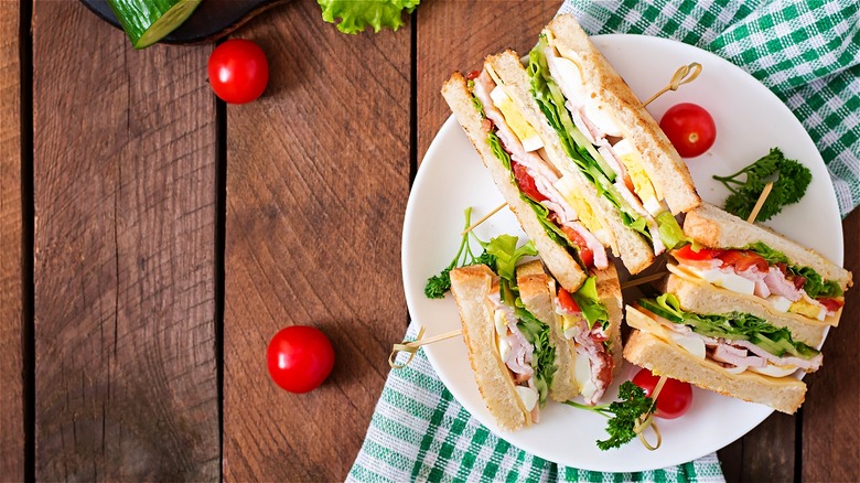 Club sandwich on white plate 