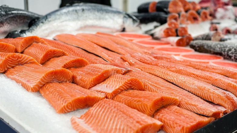 Salmon filets on ice fish market