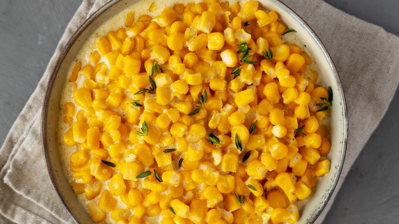 Bowl of creamed corn on napkin