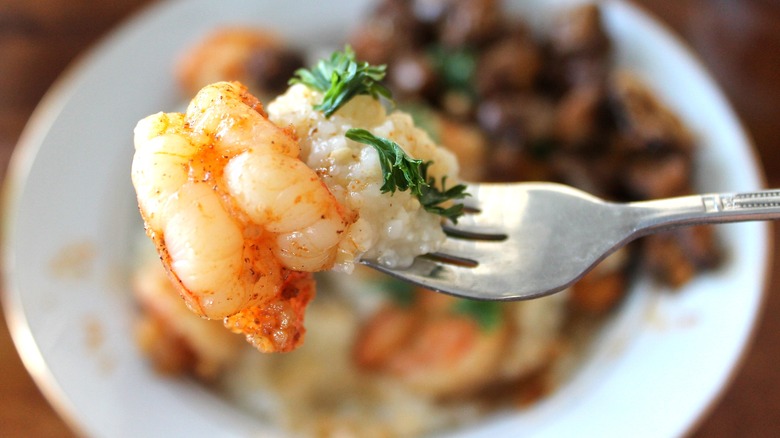 Forkful of shrimp and grits