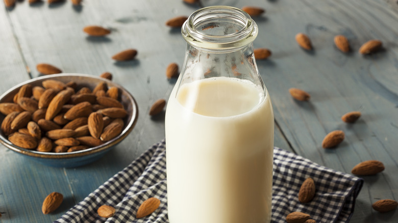 almonds near bottle of milk