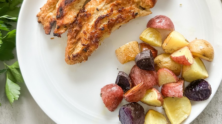 plated chicken and roasted potatoes