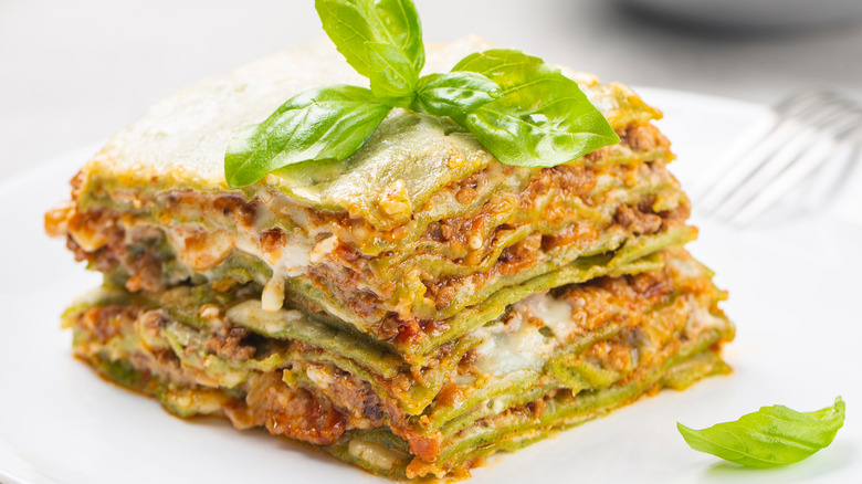 Green lasagne on plate