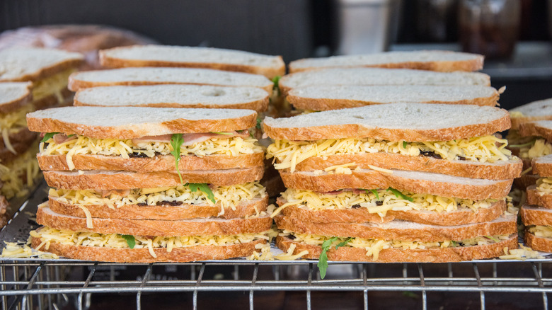 uncooked English toasties on a rack