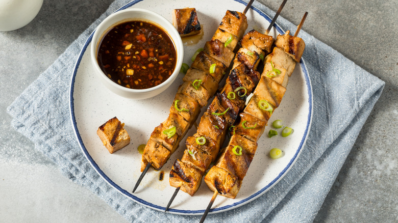 Grilled tofu skewers with sauce