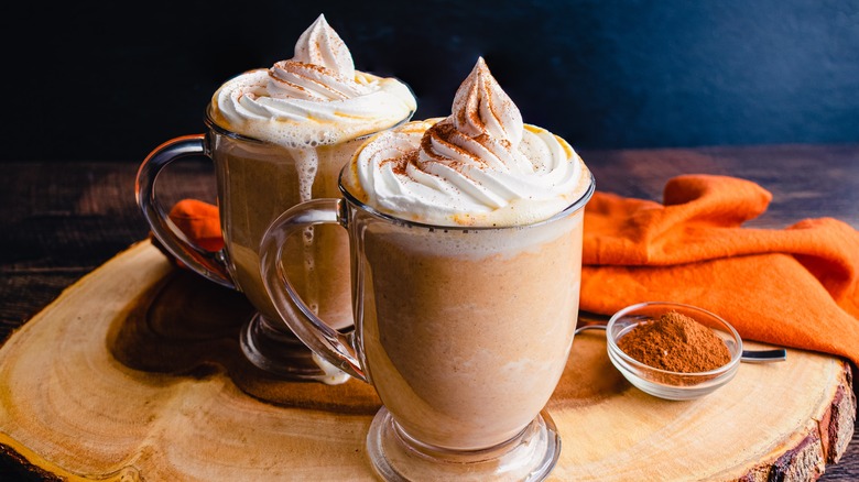 mugs of hot cocoa with whipped cream