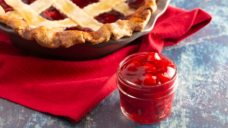 cherry pie and jar of cherry filling