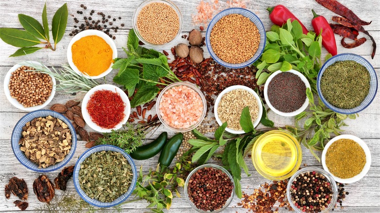 Fresh and dried spices in bowls