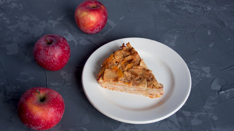 invisible apple cake slice with three honeycrisp apples