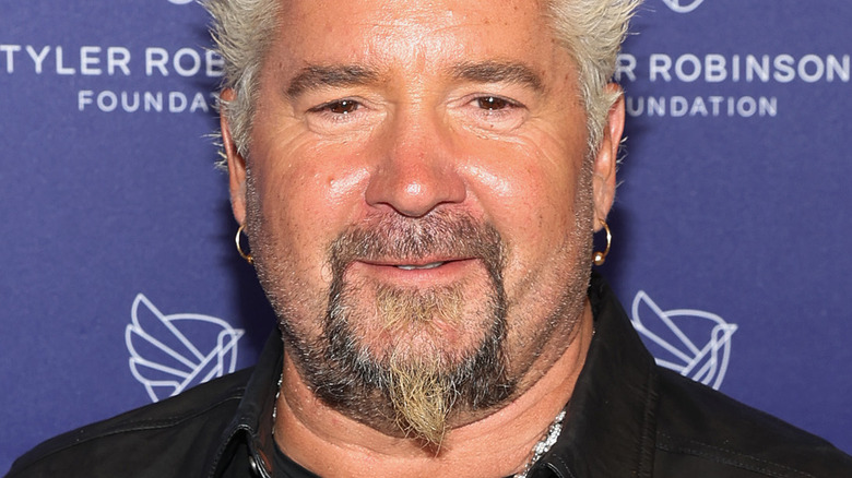 Guy Fieri with slight smile