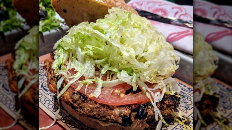 Close up of veggie burger at a Guy Fieri restaurant