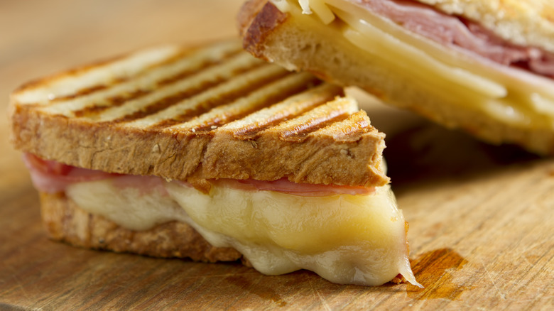 grilled cheese with ham cut into triangles