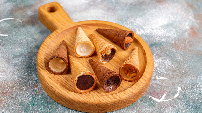 Waffle cones on wood board