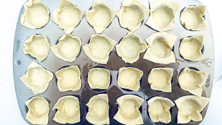 pastry squares in muffin tin