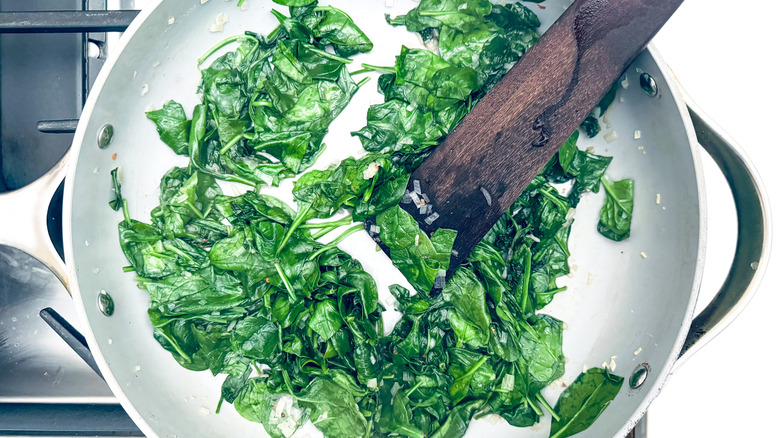 wilted spinach in pan