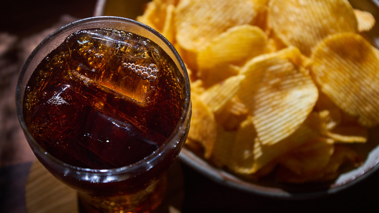 Glass of soda and chips