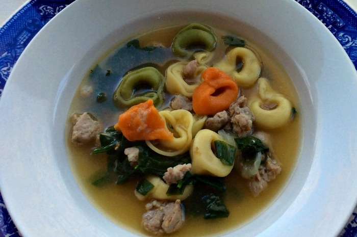 Tortellini En Brodo con Salsiccia e Spinaci