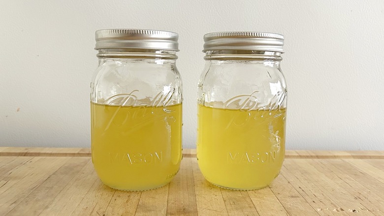 Jars of herb-infused oil