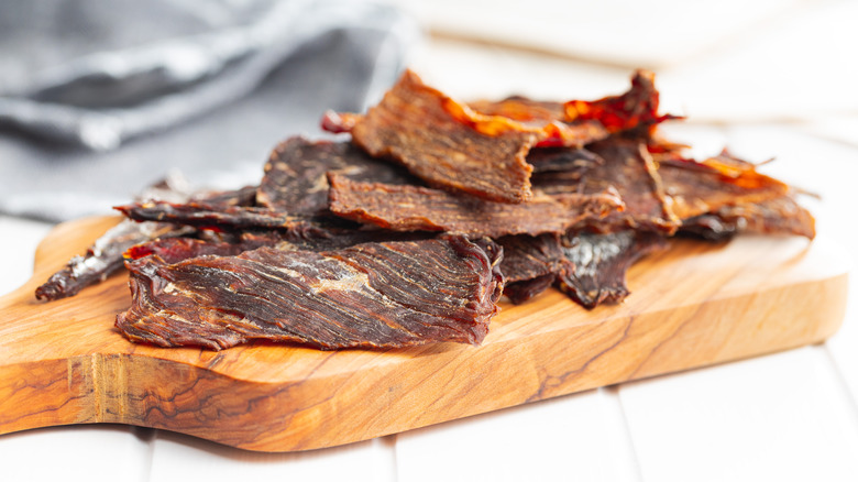 beef jerky on cutting board